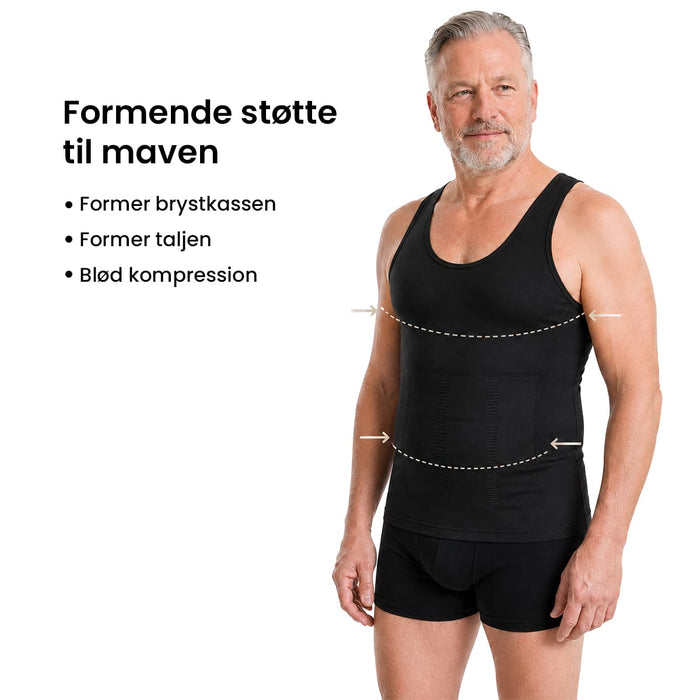 Mand iført en sort, figurformende undertrøje fra Kropsbutikken med pile, der angiver støtte til brystet.