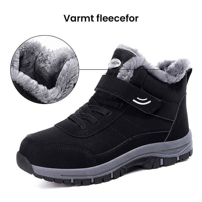 Varme vintersko med velcrolukning, grå skridsikker sål og foring af gråt imiteret pels.